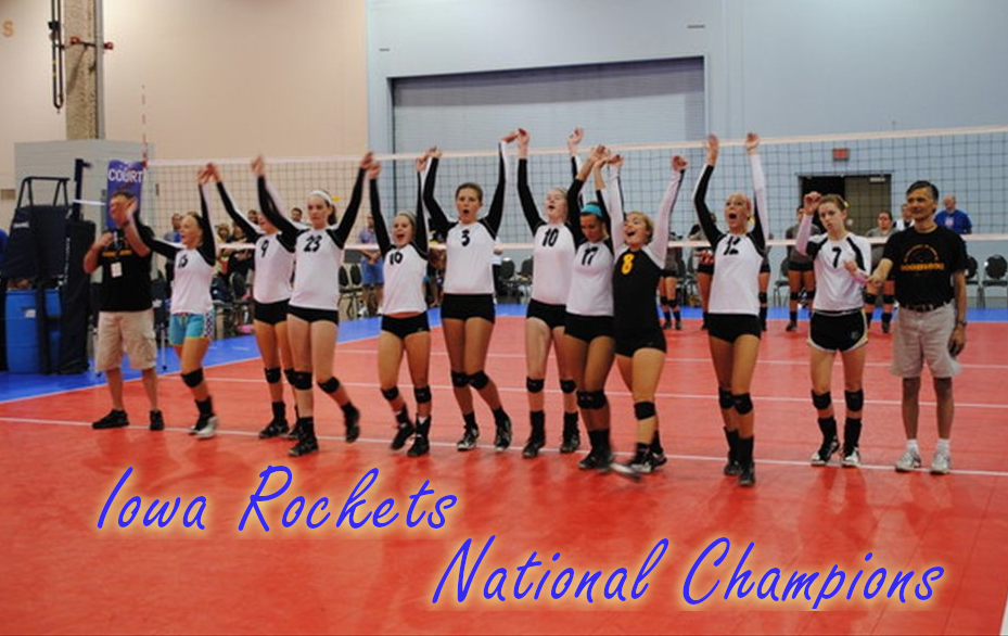 A girls' volleyball team celebrating with arms raised at the net after winning a national championship